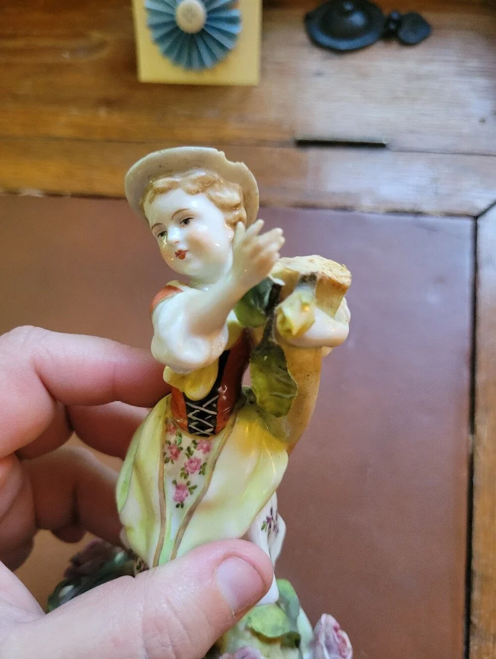 antique porcelain figurine, likely German from around 1900-repaired